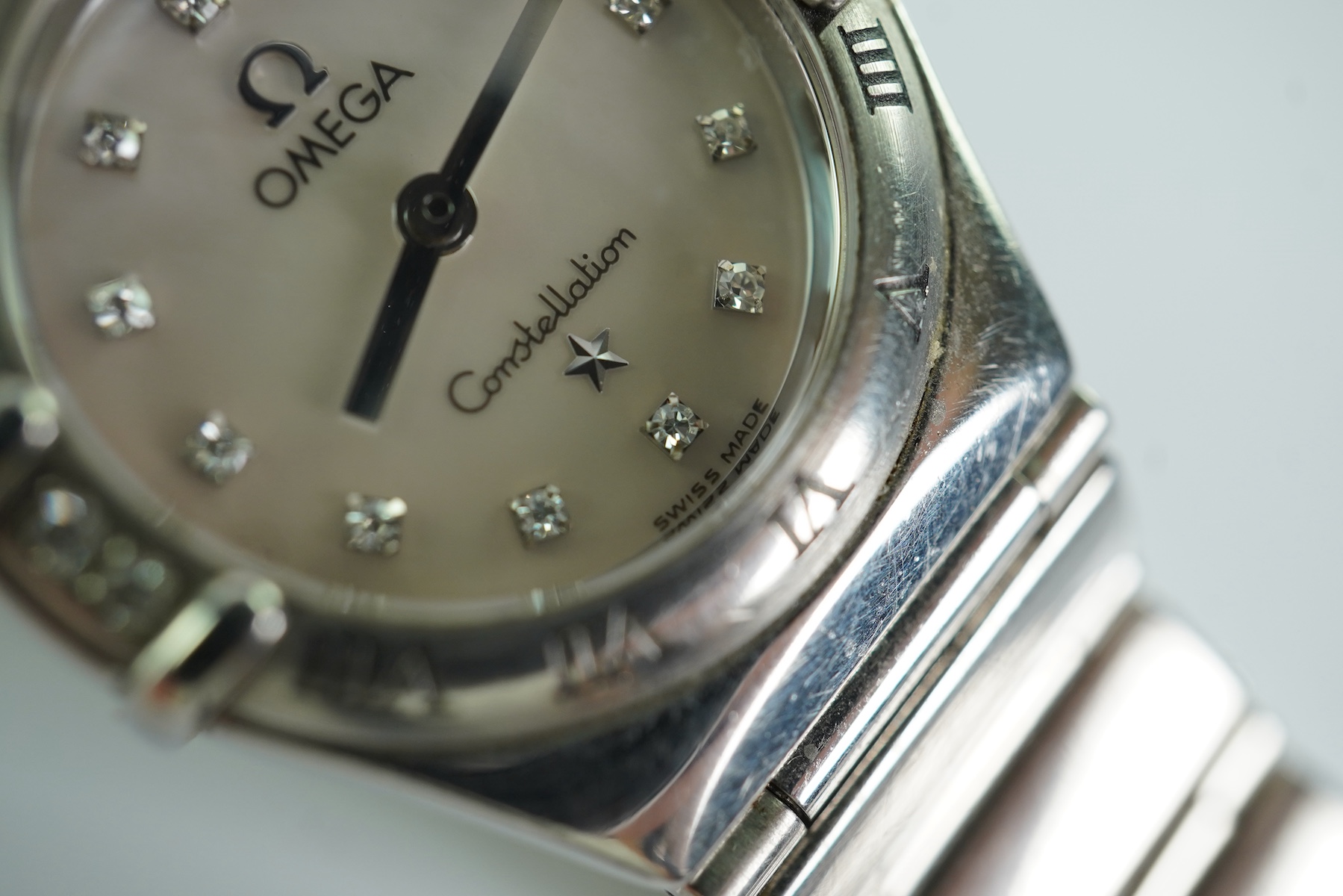 A lady's 2002 stainless steel and diamond set Omega Constellation quartz wrist watch
